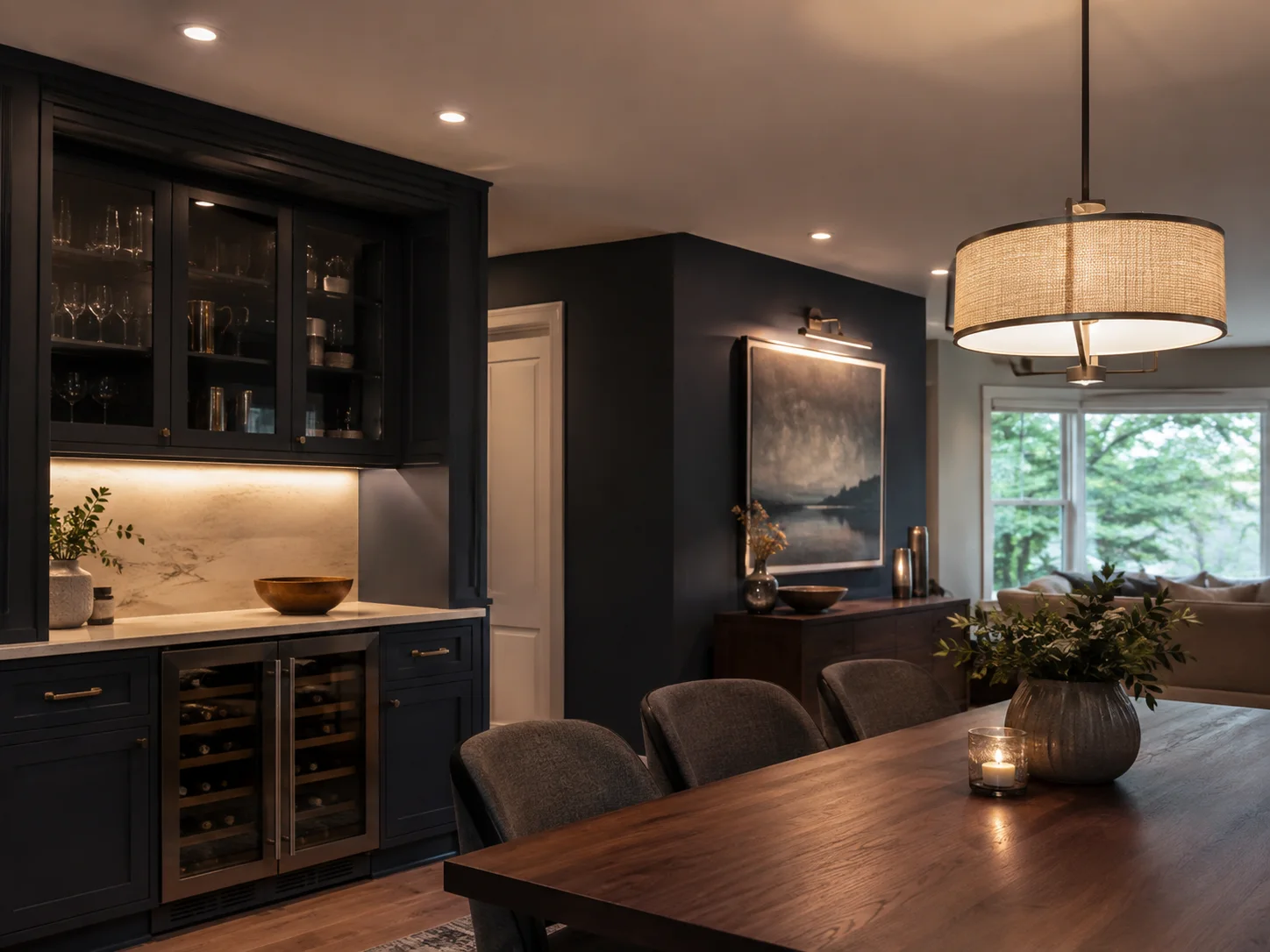 Illustrative architectural view of layered residential lighting across cabinetry, artwork, and ceiling surfaces